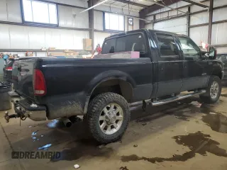 2004 Ford F-350 XL with VIN 1FTSW31P74EA91328, listed as a Copart auction lot 85856984 with 291,033 mi miles and Salvage Title. Bid and sale history available at DreamBid. Image 3.
