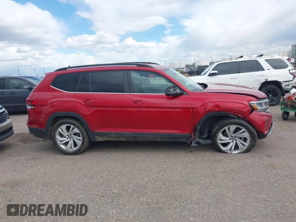2021 Volkswagen Atlas SE z VIN 1V2HR2CAXMC574861, wystawiony jako IAAI lot #42139105 z przebiegiem 61 098 mil mil oraz . Historia ofert i sprzedaży dostępna na DreamBid. Obrazek 13.