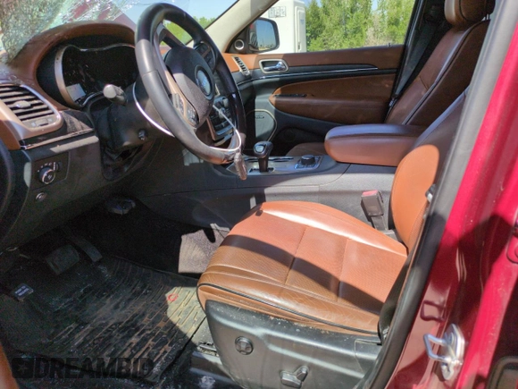 2015 Jeep Grand Cherokee Summit with VIN 1C4RJFJM6FC833687, listed as a Copart auction lot 59620695 with 110,074 mi miles and Salvage title. Bid and sale history available at DreamBid. Image 7.