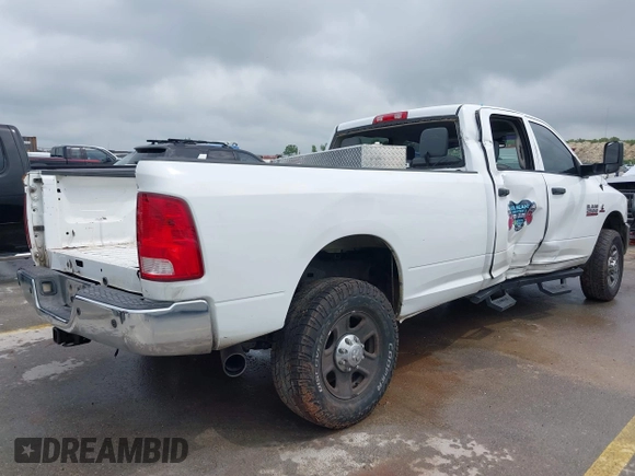 2016 Ram 2500 Tradesman with VIN 3C6UR5HLXGG237028, listed as a IAAI auction lot 42115381 with 302,532 mi miles and . Bid and sale history available at DreamBid. Image 4.