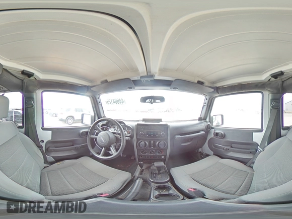 2009 Jeep Wrangler Unlimited Rubicon with VIN 1J8GA69169L731787, listed as a Copart auction lot 44604125 with 180,861 mi miles and Salvage title. Bid and sale history available at DreamBid. Image 14.