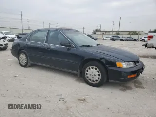 1997 Honda Accord EX with VIN 1HGCD5666VA021674, listed as a Copart auction lot 79078944 with 214,766 mi miles and Salvage Title. Bid and sale history available at carsss.com. Image 4.