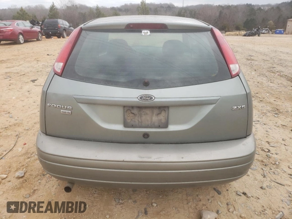 2006 Ford Focus S with VIN 1FAHP37N76W180039, listed as a Copart auction lot 58328565 with 220,696 mi miles and Salvage title. Bid and sale history available at DreamBid. Image 6.