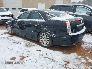 2012 Cadillac CTS Premium with VIN 1G6DP5E38C0118009, listed as a IAAI auction lot 41628041 with 126,310 mi miles and . Bid and sale history available at DreamBid. Image 3.