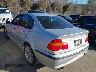 2003 BMW 3 Series 330xi with VIN WBAEW53493PN30296, listed as a IAAI auction lot 41429776 with 233,013 mi miles. Bid and sale history available at carsss.com. Image 3.