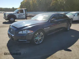 2013 Jaguar XJ Portfolio with VIN SAJWJ2GDXD8V44882, listed as a Copart auction lot 75835494 with 114,110 mi miles and Salvage Title. Bid and sale history available at DreamBid. Image 1.