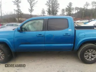2018 Toyota Tacoma SR5 with VIN 3TMAZ5CN3JM066409, listed as a IAAI auction lot 41204775 with 75,000 mi miles and . Bid and sale history available at DreamBid. Image 14.