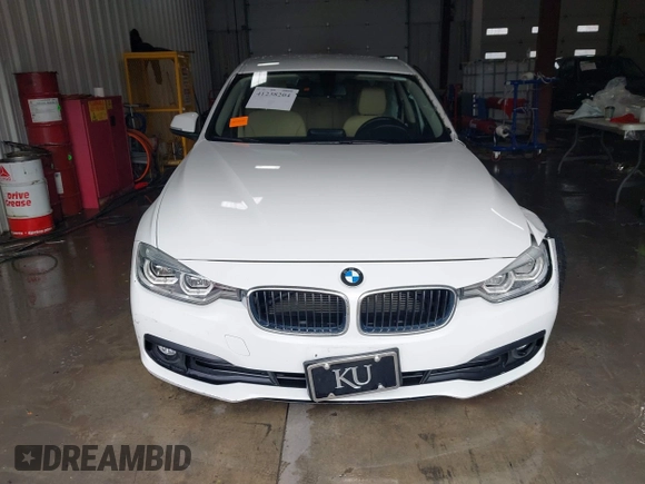 2018 BMW 3 Series 320i xDrive with VIN WBA8E5G56JNU47338, listed as a IAAI auction lot 41238204 with 54,596 mi miles. Bid and sale history available at carsss.com. Image 12.