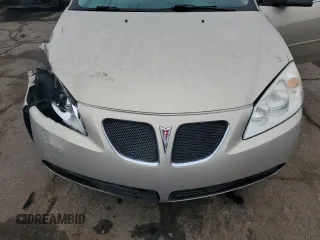 2009 Pontiac G6 1SA z VIN 1G2ZG57N294105327, wystawiony jako Copart lot #55852035 z przebiegiem 112 752 mil mil oraz Szkoda całkowita • Salvage title. Historia ofert i sprzedaży dostępna na DreamBid. Obrazek 11.