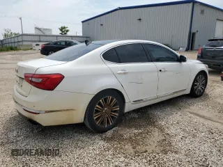 2014 Kia Cadenza Premium z VIN KNALN4D71E5121043, wystawiony jako Copart lot #59667395 z przebiegiem 244 797 mil mil oraz Czysty tytuł • Clean title. Historia ofert i sprzedaży dostępna na DreamBid. Obrazek 3.