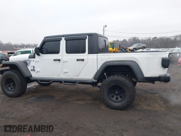 2020 Jeep Gladiator Sport S z VIN 1C6HJTAG0LL129461, wystawiony jako IAAI lot #41464713 z przebiegiem 66 625 mil mil oraz . Historia ofert i sprzedaży dostępna na DreamBid. Obrazek 14.