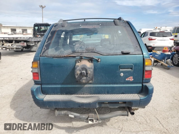 1998 Isuzu Rodeo S with VIN 4S2CM58W8W4368553, listed as a Copart auction lot 71313904 with 183,059 mi miles and Salvage title. Bid and sale history available at DreamBid. Image 6.