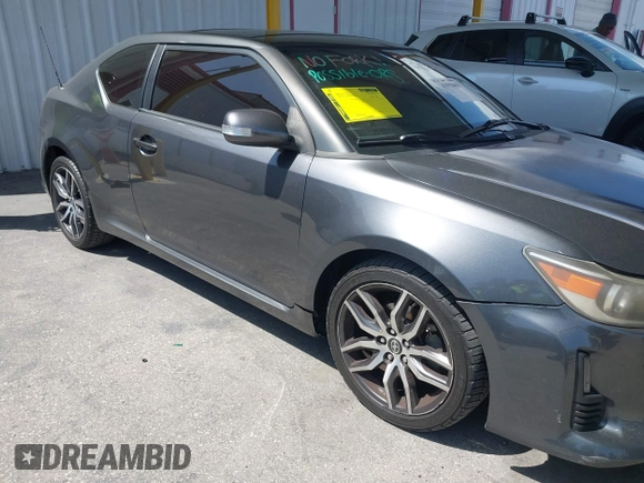 2015 Scion tC with VIN JTKJF5C7XF3088807, listed as a IAAI auction lot 41958463 with 87,647 mi miles. Bid and sale history available at carsss.com. Image 13.