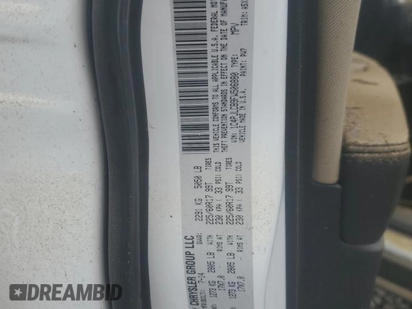 2015 Jeep Cherokee Latitude with VIN 1C4PJLCB9FW506880, listed as a Copart auction lot 54125765 with Not Provided miles and Salvage Title. Bid and sale history available at DreamBid. Image 13.