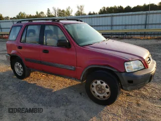 2001 Honda CR-V LX with VIN JHLRD174X1S014815, listed as a Copart auction lot 75460654 with 221,392 mi miles and Salvage Title. Bid and sale history available at carsss.com. Image 4.