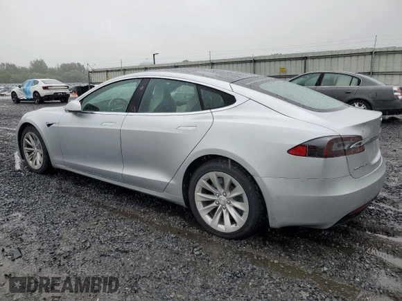 2017 Tesla Model S 100D with VIN 5YJSA1E20HF190126, listed as a Copart auction lot 60087655 with 42,025 mi miles and Salvage title. Bid and sale history available at DreamBid. Image 2.