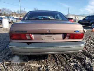 1989 Ford Taurus GL with VIN 1FABP52U1KA299938, listed as a Copart auction lot 86684144 with 52,675 mi miles and Salvage Title. Bid and sale history available at carsss.com. Image 6.
