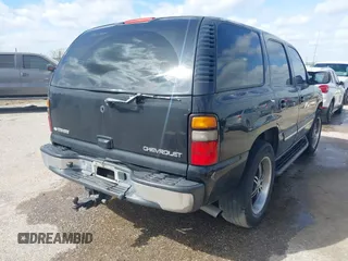2004 Chevrolet Tahoe LT with VIN 1GNEC13Z74J323109, listed as a IAAI auction lot 41829422 with 261,636 mi miles. Bid and sale history available at carsss.com. Image 4.
