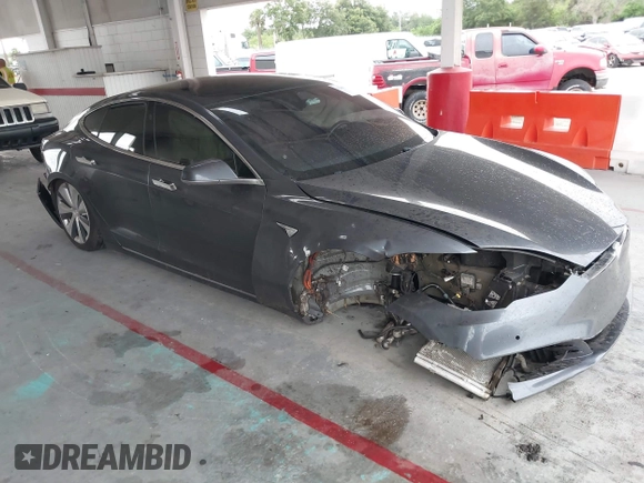 2021 Tesla Model S Long Range Plus with VIN 5YJSA1E28MF421655, listed as a IAAI auction lot 42407234 with 111,443 mi miles and . Bid and sale history available at DreamBid. Image 1.