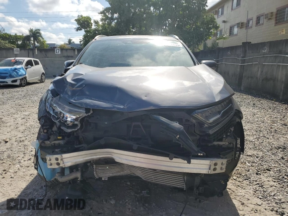 2020 Honda CR-V Touring with VIN 2HKRW2H96LH677520, listed as a Copart auction lot 52264155 with 33,909 mi miles and Salvage Title. Bid and sale history available at DreamBid. Image 5.