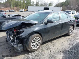 2016 Toyota Camry XLE with VIN 4T4BF1FK3GR548701, listed as a IAAI auction lot 41759683 with 102,049 mi miles. Bid and sale history available at carsss.com. Image 17.