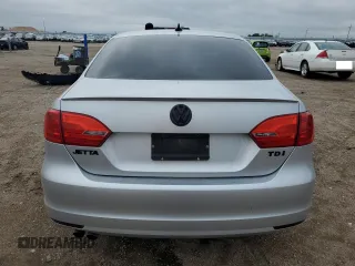 2012 Volkswagen Jetta TDI w/Premium & Nav z VIN 3VWLL7AJ8CM365576, wystawiony jako Copart lot #56728245 z przebiegiem 102 088 mil mil oraz Szkoda całkowita • Salvage title. Historia ofert i sprzedaży dostępna na DreamBid. Obrazek 6.