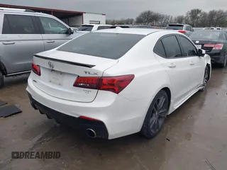 2019 Acura TLX w/A-Spec Pkg with VIN 19UUB1F63KA009058, listed as a IAAI auction lot 41456033 with 204,009 mi miles. Bid and sale history available at carsss.com. Image 4.
