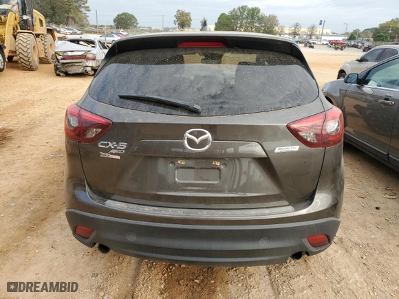 2016 Mazda CX-5 Grand Touring with VIN JM3KE4DYXG0885407, listed as a Copart auction lot 79315894 with NaN miles and Salvage Title. Bid and sale history available at carsss.com. Image 6.