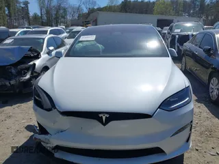2023 Tesla Model X with VIN 7SAXCDE50PF414198, listed as a IAAI auction lot 41880957 with Not Provided miles and . Bid and sale history available at DreamBid. Image 11.