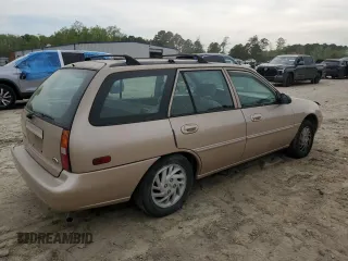 1999 Ford Escort SE with VIN 3FAFP15P0XR167167, listed as a Copart auction lot 52094765 with 154,960 mi miles and Salvage Title. Bid and sale history available at carsss.com. Image 3.