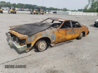 1985 Cadillac Seville z VIN 1G6KS6988FE825863, wystawiony jako Copart lot #52723115 z przebiegiem Nie podano mil oraz Szkody całkowita. Historia ofert i sprzedaży dostępna na DreamBid. Obrazek 1.