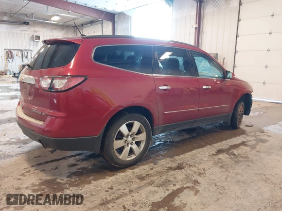 2014 Chevrolet Traverse LTZ z VIN 1GNKRJKD8EJ210990, wystawiony jako IAAI lot #41655601 z przebiegiem 218 804 mil mil oraz . Historia ofert i sprzedaży dostępna na DreamBid. Obrazek 4.