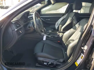 2016 BMW 4 Series 428i z VIN WBA4A9C59GG696298, wystawiony jako Copart lot #52348325 z przebiegiem 87 319 mil mil oraz Szkoda całkowita • Salvage title. Historia ofert i sprzedaży dostępna na DreamBid. Obrazek 7.