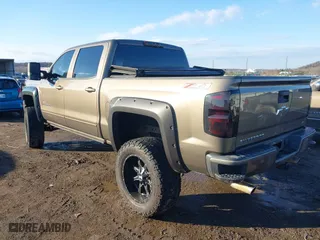 2015 Chevrolet Silverado 1500 LT with VIN 3GCUKREC9FG322269, listed as a IAAI auction lot 41298687 with 147,336 mi miles. Bid and sale history available at carsss.com. Image 3.