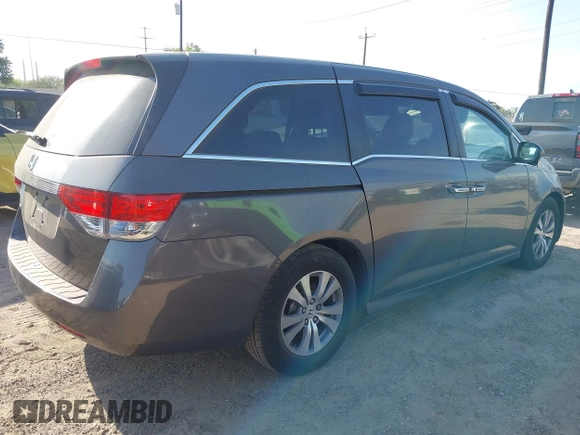 2015 Honda Odyssey EX-L with VIN 5FNRL5H67FB130663, listed as a IAAI auction lot 41988034 with 180,254 mi miles and . Bid and sale history available at carsss.com. Image 4.