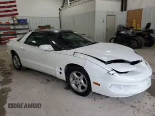 1998 Pontiac Firebird Firebird z VIN 2G2FS22KXW2207621, wystawiony jako Copart lot #82717434 z przebiegiem 63 973 mil mil oraz Szkoda całkowita • Salvage title. Historia ofert i sprzedaży dostępna na DreamBid. Obrazek 4.