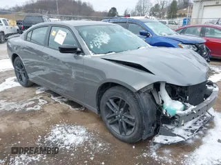2019 Dodge Charger SXT with VIN 2C3CDXJG5KH706910, listed as a IAAI auction lot 40971406 with 43,022 mi miles and . Bid and sale history available at DreamBid. Image 1.