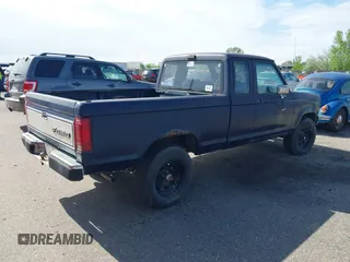 1987 Ford Ranger with VIN 1FTCR15T7HPA87264, listed as a IAAI auction lot 42116751 with 76,790 mi miles. Bid and sale history available at carsss.com. Image 4.