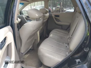 2003 Nissan Murano SL with VIN JN8AZ08W23W212374, listed as a IAAI auction lot 41937611 with 146,922 mi miles and . Bid and sale history available at carsss.com. Image 8.