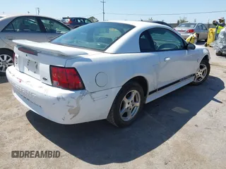 2002 Ford Mustang Standard z VIN 1FAFP40452F115179, wystawiony jako IAAI lot #42639855 z przebiegiem Nie podano mil oraz . Historia ofert i sprzedaży dostępna na DreamBid. Obrazek 4.