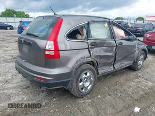2011 Honda CR-V LX z VIN 5J6RE3H3XBL010040, wystawiony jako IAAI lot #42382318 z przebiegiem Nie podano mil oraz . Historia ofert i sprzedaży dostępna na DreamBid. Obrazek 4.