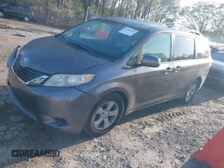 2011 Toyota Sienna LE AAS with VIN 5TDKK3DC9BS100414, listed as a IAAI auction lot 41901835 with 186,634 mi miles and . Bid and sale history available at DreamBid. Image 2.