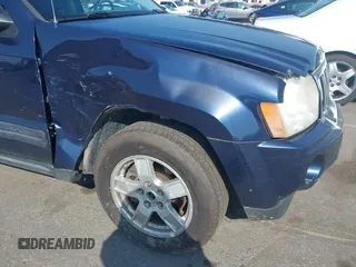 2005 Jeep Grand Cherokee Laredo with VIN 1J4HR48N45C605543, listed as a IAAI auction lot 42612473 with 158,456 mi miles and . Bid and sale history available at DreamBid. Image 6.