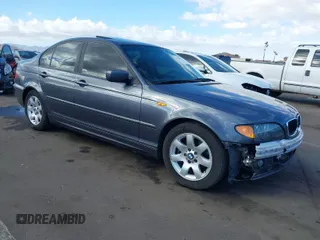 2002 BMW 3 Series 325i with VIN WBAET37482NG74460, listed as a IAAI auction lot 41712972 with 176,762 mi miles. Bid and sale history available at carsss.com. Image 1.