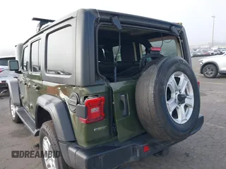 2021 Jeep Wrangler Unlimited Willys with VIN 1C4HJXDM1MW812674, listed as a IAAI auction lot 41670637 with 59,241 mi miles and . Bid and sale history available at DreamBid. Image 6.