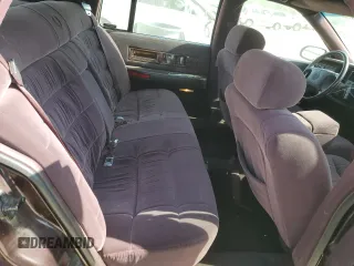 1995 Cadillac Fleetwood z VIN 1G6DW52P6SR702106, wystawiony jako Copart lot #48826215 z przebiegiem 140 971 mil mil oraz Szkoda całkowita • Salvage title. Historia ofert i sprzedaży dostępna na DreamBid. Obrazek 10.