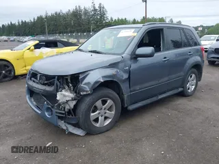 2007 Suzuki Grand Vitara XSport z VIN JS3TD944774203944, wystawiony jako IAAI lot #42290128 z przebiegiem 168 416 mil mil oraz . Historia ofert i sprzedaży dostępna na DreamBid. Obrazek 2.