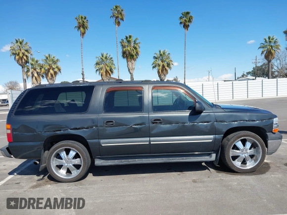 2003 Chevrolet Suburban LS with VIN 3GNEC16T63G115908, listed as a IAAI auction lot 41950165 with 202,075 mi miles. Bid and sale history available at carsss.com. Image 13.