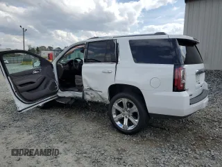 2019 GMC Yukon Denali with VIN 1GKS1CKJ6KR268230, listed as a Copart auction lot 47489035 with 49,549 mi miles and Salvage Title. Bid and sale history available at carsss.com. Image 2.