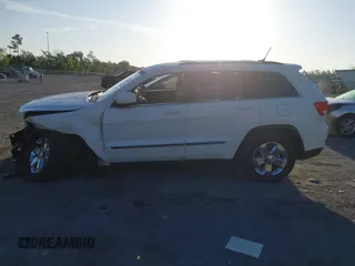 2011 Jeep Grand Cherokee Laredo with VIN 1J4RS4GGXBC739433, listed as a IAAI auction lot 41794031 with 174,672 mi miles and . Bid and sale history available at DreamBid. Image 15.